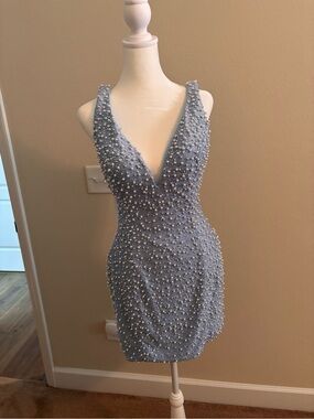 Pearl-Embellished Light Blue Mini Dress with Deep V